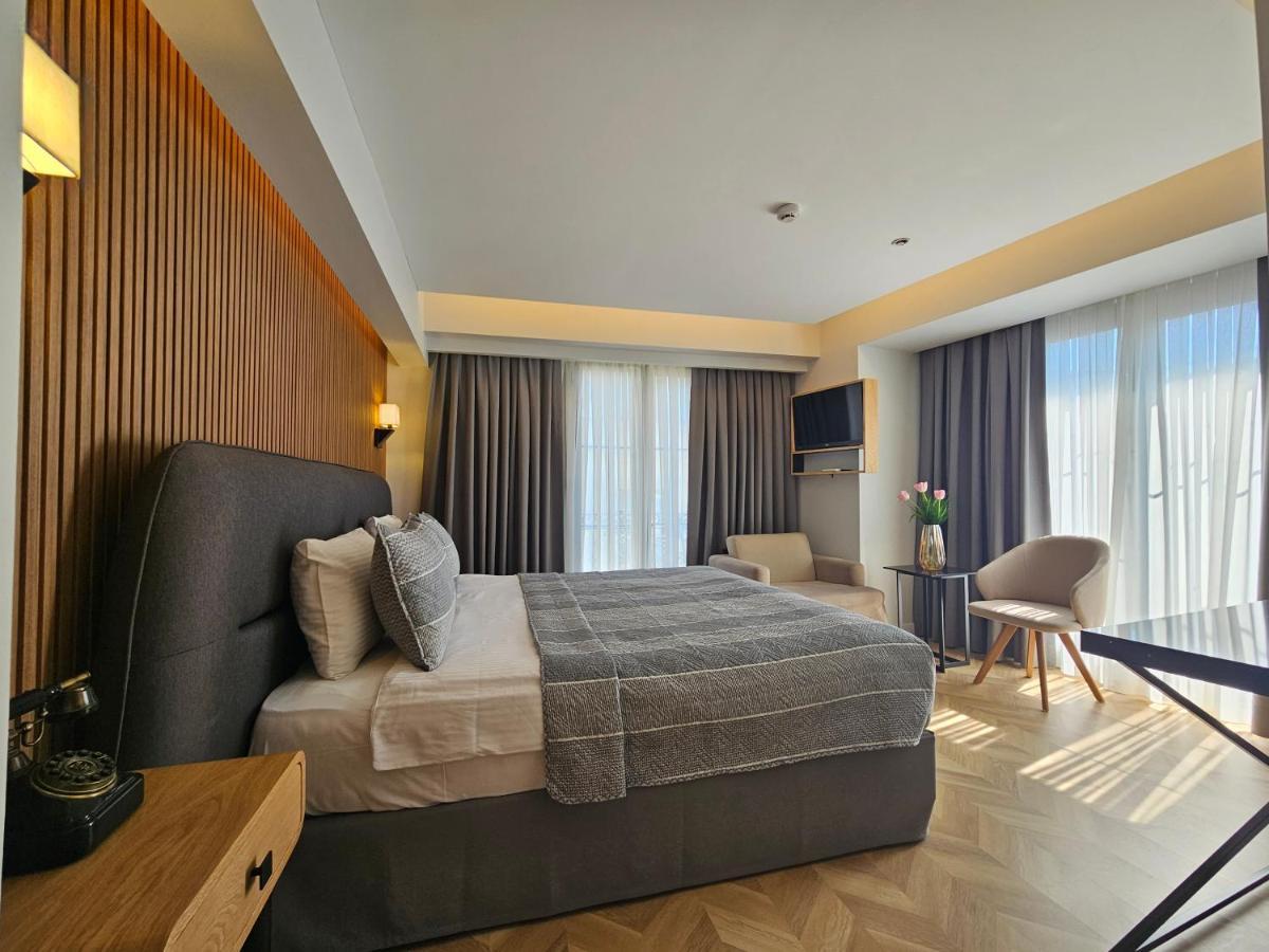 Habitación doble + 1 sofá cama