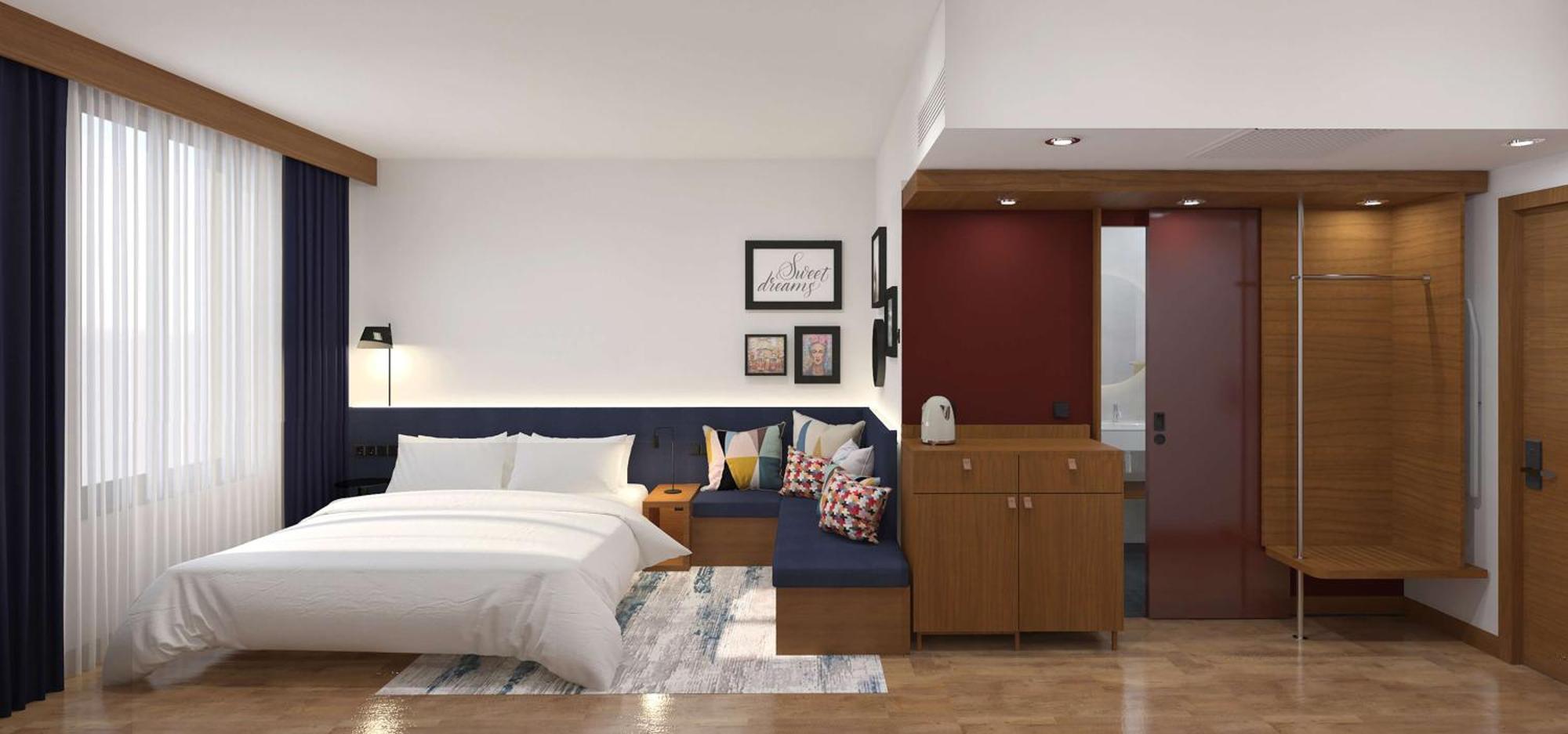 Habitación con cama extragrande.