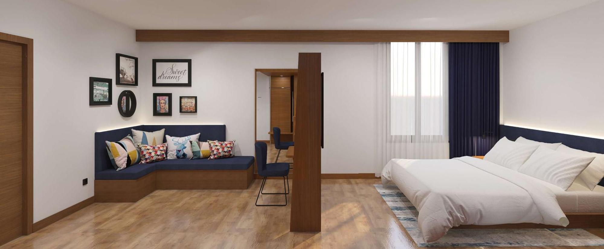 Habitación con cama extragrande y sofá cama