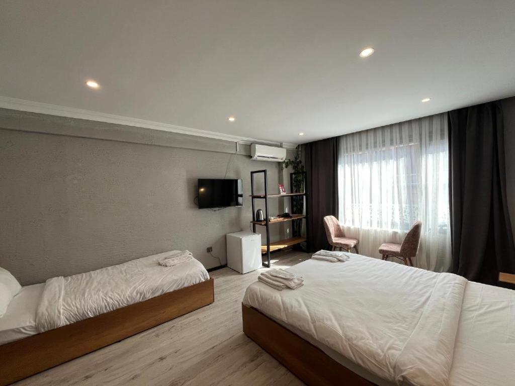 Quarto Triplo Deluxe