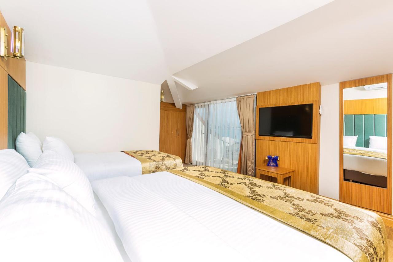 Quarto Triplo Superior com Vista do Mar
